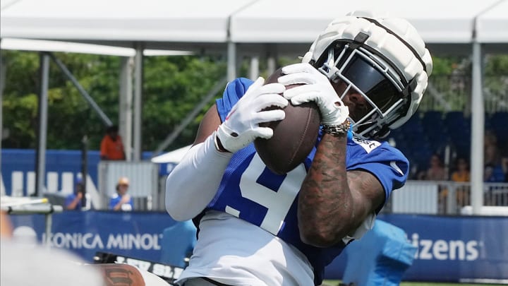 East Rutherford, NJ -- August 1, 2024 -- Wide receiver Malik Nabers makes this TD catch from a Daniel Jones pass during practice today at training camp for the New York Giants.