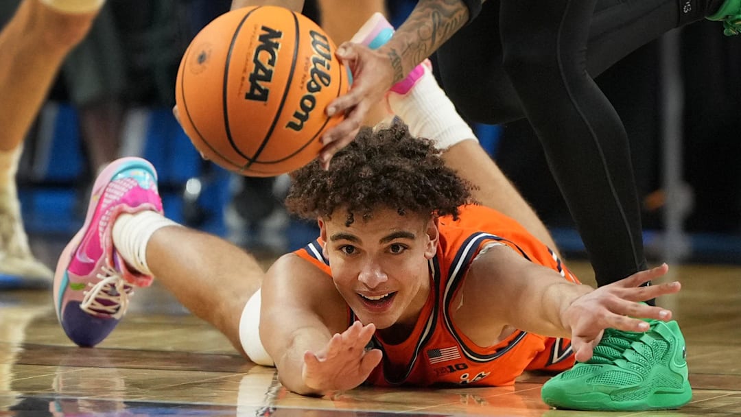 Mar 21, 2026; Greenville, SC, USA; Illinois Fighting Illini guard Keaton Wagler (23) looks at the ball as VCU Rams guard Terrence Hill Jr. (6) picks it up in the first half during a second round game of the men's 2026 NCAA Tournament at Bon Secours Wellness Arena. Mandatory Credit: Bob Donnan-Imagn Images