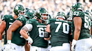 Michigan State's offensive line, from left, Ashton Lepo, Dallas Fincher, Tanner Miller, Luke Newman and Brandon Baldwin huddle up during the fourth quarter in the game against Prairie View A&M on Saturday, Sept. 14, 2024, at Spartan Stadium in East Lansing.