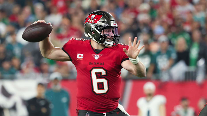 Jan 15, 2024; Tampa, Florida, USA; Tampa Bay Buccaneers quarterback Baker Mayfield (6) throws against the Philadelphia Eagles during the first half of a 2024 NFC wild card game at Raymond James Stadium. Mandatory Credit: Kim Klement Neitzel-Imagn Images