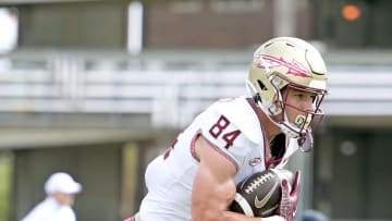 Apr 20, 2024; Tallahassee, Florida, USA; Florida State Seminoles tight end Kyle Morlock (84) runs with the ball during the Spring Showcase at Doak S. Campbell Stadium. Mandatory Credit: Melina Myers-USA TODAY Sports