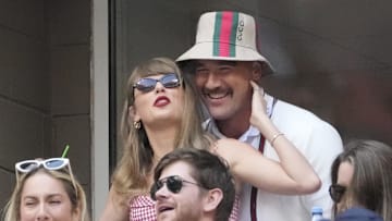 Sep 8, 2024; Flushing, NY, USA; Recording artist Taylor Swift and Kansas City Chiefs tight end Travis Kelce talk during the men’s singles final of the 2024 U.S. Open tennis tournament at USTA Billie Jean King National Tennis Center. 