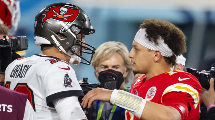 Feb 7, 2021; Tampa, FL, USA;  Tampa Bay Buccaneers quarterback Tom Brady (left) greets Kansas City Chiefs quarterback Patrick Mahomes following Super Bowl LV at Raymond James Stadium.  Mandatory Credit: Mark J. Rebilas-USA TODAY Sports