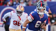 Nov 2, 2025; East Rutherford, New Jersey, USA; New York Giants quarterback Jaxson Dart (6) carries the ball against the San Francisco 49ers during the second half at MetLife Stadium. Mandatory Credit: Ed Mulholland-Imagn Images