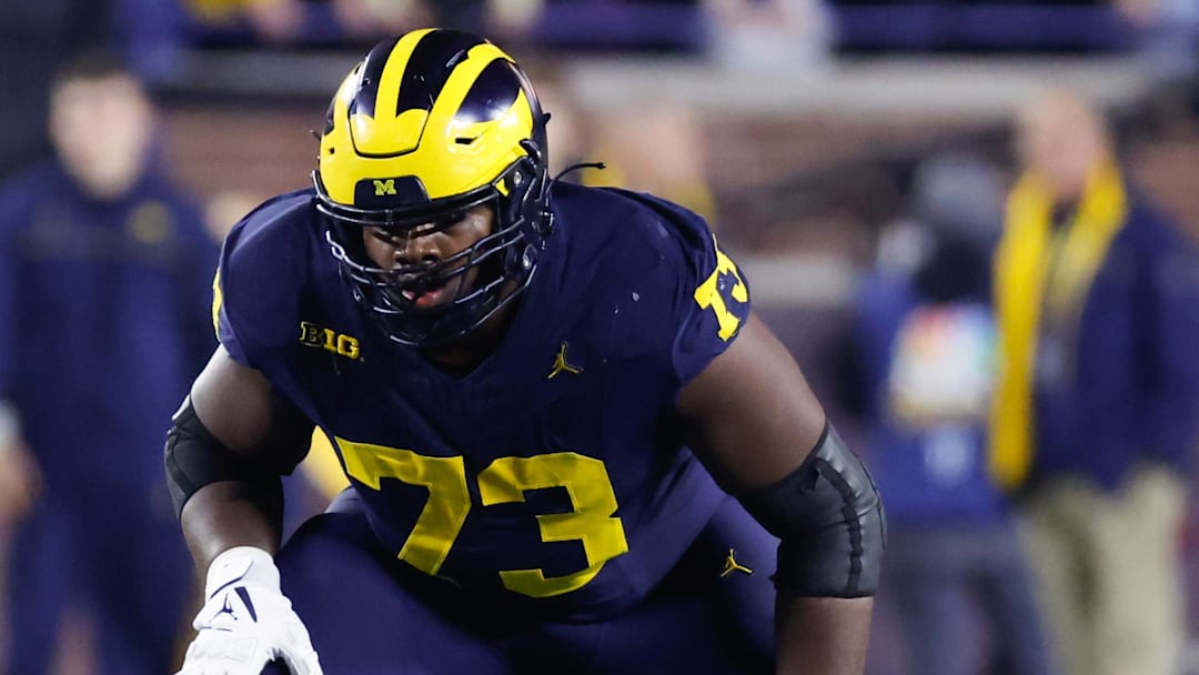 Nov 4, 2023; Ann Arbor, Michigan, USA;  Michigan Wolverines offensive lineman LaDarius Henderson (73) gets set on offense at Michigan Stadium. 