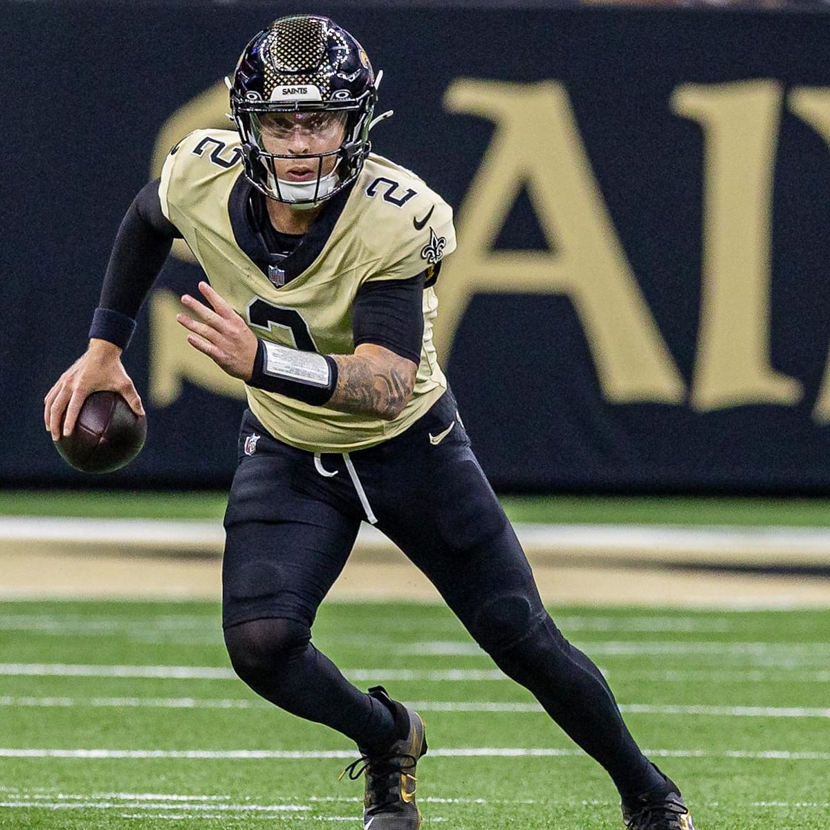 A stadium crowd cheering for their star