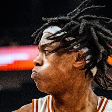 Mar 8, 2025; Austin, Texas, USA; Texas Longhorns guard Tre Johnson (20) brings the rebound down in the second half of the Longhorns' game against the Sooners at Moody Center. Mandatory Credit: Sara Diggins-Imagn Images