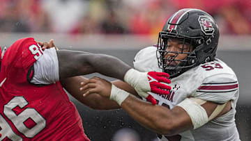 Sep 16, 2023; Athens, Georgia, USA; South Carolina Gamecocks offensive lineman Vershon Lee (53) blocks Georgia Bulldogs defensive lineman Zion Logue (96) during the second half at Sanford Stadium. Mandatory Credit: Dale Zanine-Imagn Images