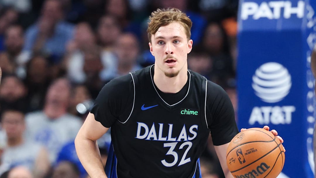 Nov 16, 2025; Dallas, Texas, USA;  Dallas Mavericks forward Cooper Flagg (32) dribbles against the Portland Trail Blazers during the second quarter at American Airlines Center. Mandatory Credit: Kevin Jairaj-Imagn Images