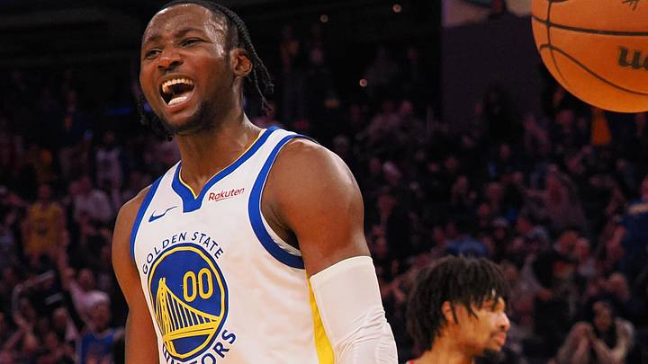 Dec 6, 2023; San Francisco, California, USA; Golden State Warriors forward Jonathan Kuminga (00) reacts after a dunk against the Portland Trail Blazers during the fourth quarter at Chase Center. Mandatory Credit: Kelley L Cox-Imagn Images