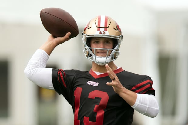 San Francisco 49ers quarterback Brock Purdy (13) throws a pass during drills on the second day of training camp. San Francisco 49ers quarterback Brock Purdy (13) throws a pass during drills on the second day of training camp.