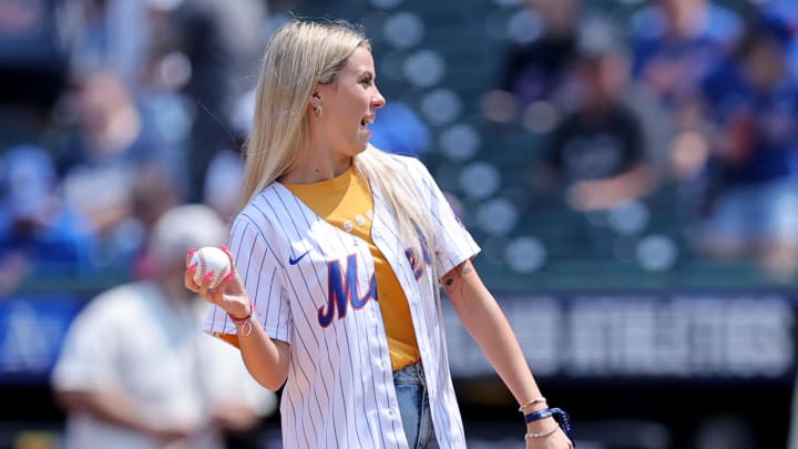 Aug 15, 2024; New York City, New York, USA; Viral internet star Haliey Welch throws out a ceremonial first pitch before a game between the New York Mets and the Oakland Athletics at Citi Field. Mandatory Credit: Brad Penner-USA TODAY Sports Aug 15, 2024; New York City, New York, USA; Viral internet star Haliey Welch throws out a ceremonial first pitch before a game between the New York Mets and the Oakland Athletics at Citi Field. Mandatory Credit: Brad Penner-USA TODAY Sports
