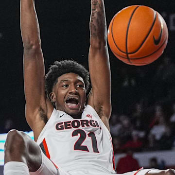 Nov 3, 2025; Athens, Georgia, USA; Georgia Bulldogs forward Jake Wilkins (21) dunks the ball against the Bellarmine Knights during the second half at Stegeman Coliseum. Mandatory Credit: Dale Zanine-Imagn Images