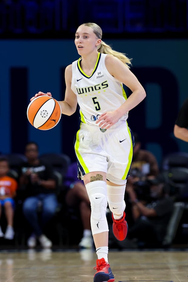 Dallas Wings guard Paige Bueckers dribbles against the Phoenix Mercury