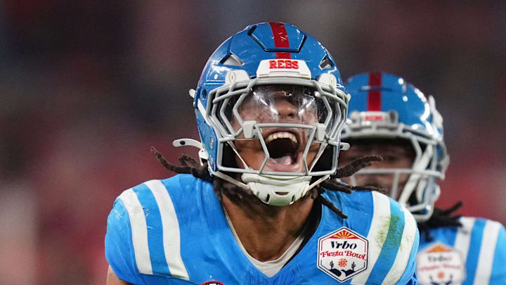 Ole Miss Rebels linebacker TJ Dottery (6) celebrates his tackle against the Miami Hurricanes during their Vrbo Fiesta Bowl matchup at State Farm Stadium on Jan. 8, 2026.