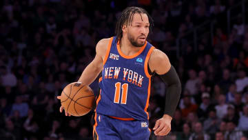 New York Knicks guard Jalen Brunson (11) brings the ball up.
