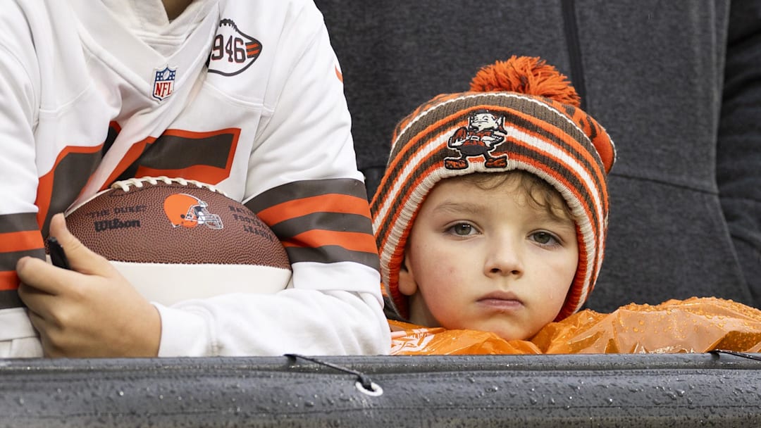Dec 29, 2024; Cleveland, Ohio, USA; A Cleveland Browns fan watches warmups before the game against the Miami Dolphins at Huntington Bank Field. Mandatory Credit: Scott Galvin-Imagn Images