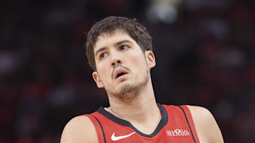 Feb 9, 2025; Houston, Texas, USA; Houston Rockets guard Reed Sheppard (15) reacts after a play during the game against the Toronto Raptors at Toyota Center. Mandatory Credit: Troy Taormina-Imagn Images