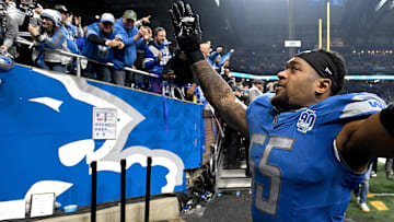 Detroit Lions linebacker Derrick Barnes (55) reacts after winning a 2024 NFC divisional round game against the Tampa Bay Buccaneers at Ford Field.