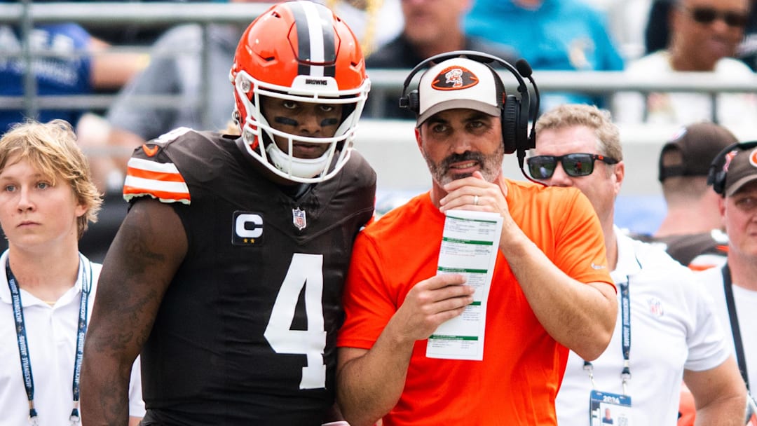 Sep 15, 2024; Jacksonville, Florida, USA; Cleveland Browns quarterback Deshaun Watson (4) and head coach Kevin Stefanski talk before a play in the first quarter against the Jacksonville Jaguars at EverBank Stadium. Mandatory Credit: Jeremy Reper-Imagn Images