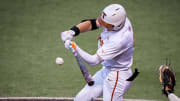 Texas Longhorns infielder Jared Thomas (9) bats in the fourth inning of the LonghornsÕ game against