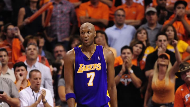 May 29, 2010; Phoenix, AZ, USA; Los Angeles Lakers' Lamar Odom (7) reacts during the third quarter in game six of the western conference finals in the 2010 NBA Playoffs at US Airways Center.  The Lakers defeated the Suns 111-103.  Mandatory Credit: Jennifer Stewart-USA TODAY Sports