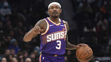 Jan 7, 2025; Charlotte, North Carolina, USA;  Phoenix Suns guard Bradley Beal (3) signals to his team during the second half against the Charlotte Hornets at the Spectrum Center. Mandatory Credit: Sam Sharpe-Imagn Images
