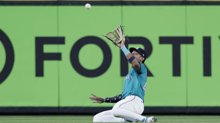 Seattle Mariners center fielder Julio Rodriguez catches a fly ball against the Houston Astros on July 20 at T-Mobile Park.