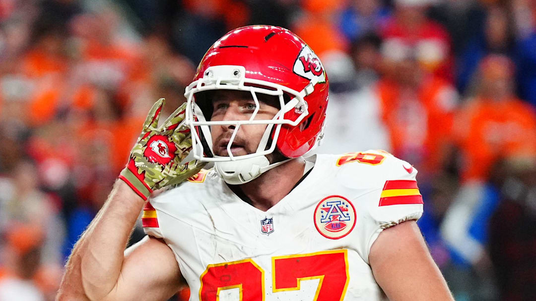 Nov 16, 2025; Denver, Colorado, USA; Kansas City Chiefs tight end Travis Kelce (87) reacts after his touchdown in the fourth quarter against the Denver Broncos at Empower Field at Mile High. Mandatory Credit: Ron Chenoy-Imagn Images