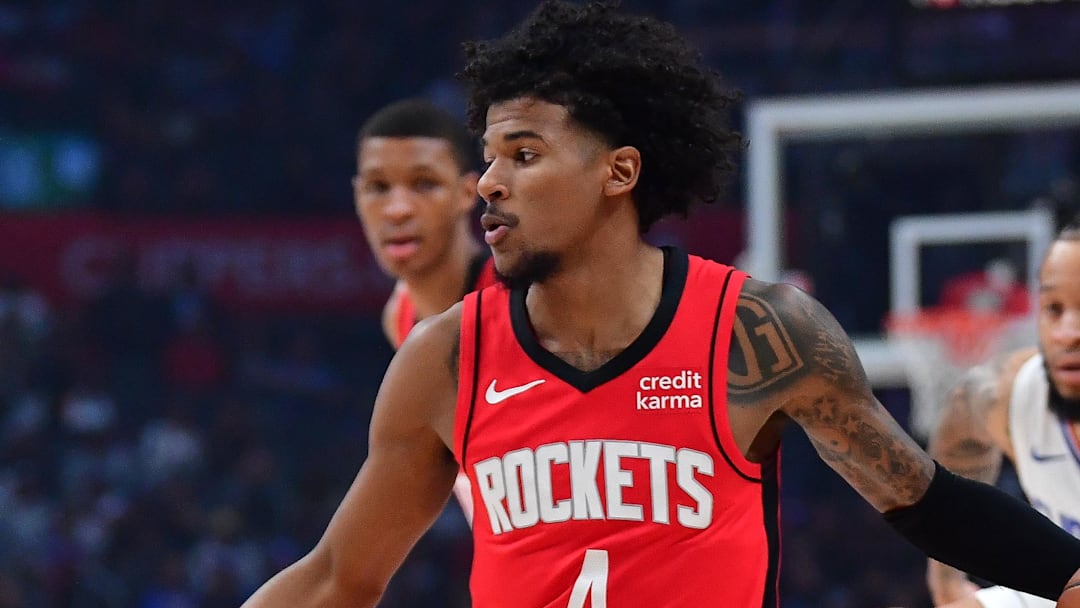 Apr 14, 2024; Los Angeles, California, USA; Houston Rockets guard Jalen Green (4) moves the ball against the Los Angeles Clippers during the first half at Crypto.com Arena. Mandatory Credit: Gary A. Vasquez-Imagn Images