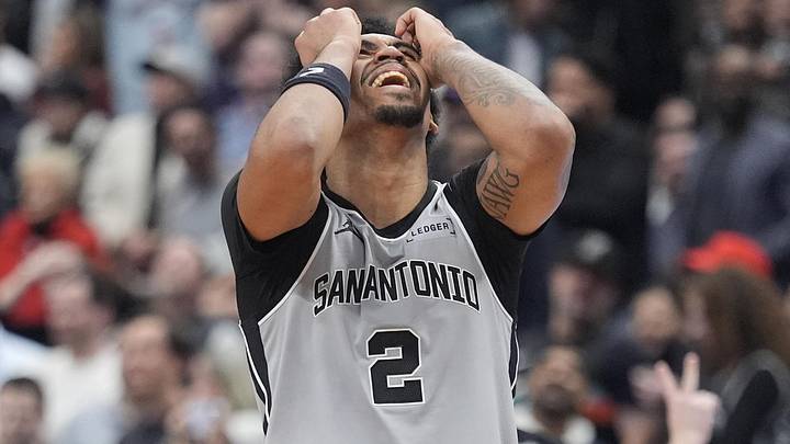 Feb 25, 2026; Toronto, Ontario, CAN; San Antonio Spurs guard Dylan Harper (2) reacts after missing two free throws against the Toronto Raptors during the second half at Scotiabank Arena. Mandatory Credit: John E. Sokolowski-Imagn Images