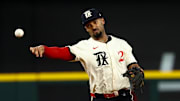 Texas Rangers second baseman Marcus Semien (2) throws to first base during the seventh inning against the Philadelphia Phillies at Globe Life Field. 