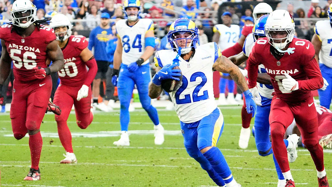 Los Angeles Rams running back Blake Corum (22) runs for a touchdown against the Arizona Cardinals in the second half at State Farm Stadium on Dec 7, 2025, in Glendale, Ariz.