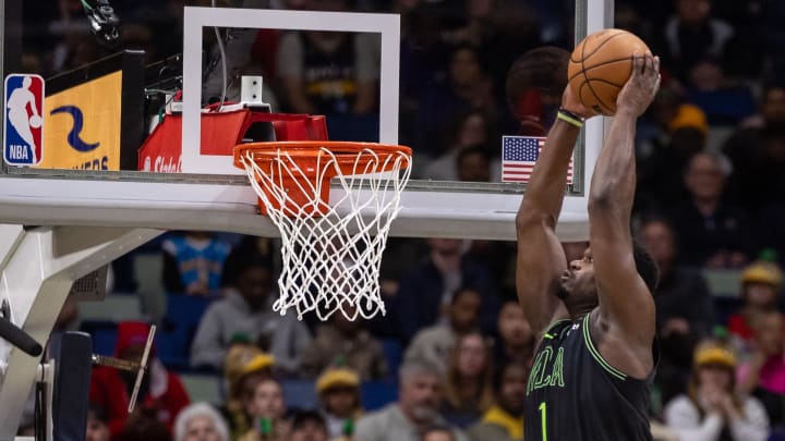 Jan 19, 2024; New Orleans, Louisiana, USA;  New Orleans Pelicans forward Zion Williamson (1) dunks the ball against the Phoenix Suns during the first half at Smoothie King Center. Mandatory Credit: Stephen Lew-USA TODAY Sports