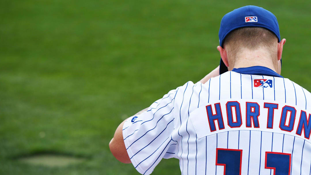 Cade Horton sits during a warmup at Four Winds Feild on June 22, 2023.