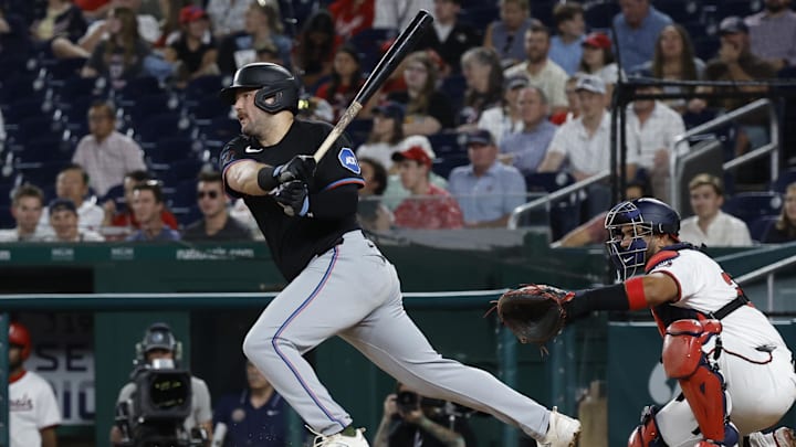 Sep 12, 2024; Washington, District of Columbia, USA; Miami Marlins third baseman Jake Burger (36) singles against the Washington Nationals during the sixth inning at Nationals Park. Mandatory Credit: Geoff Burke-Imagn Images