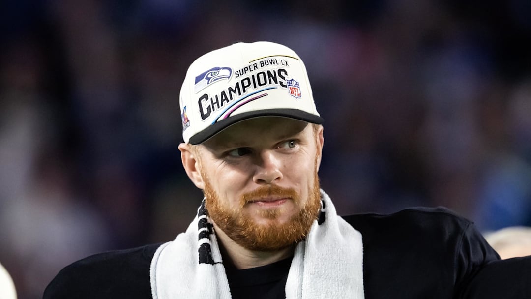 Seattle Seahawks quarterback Sam Darnold celebrates with the Vince Lombardi Trophy Seattle Seahawks quarterback Sam Darnold celebrates with the Vince Lombardi Trophy