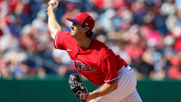 Mar 7, 2023; Clearwater, Florida, USA;  Philadelphia Phillies pitcher Griff McGarry (71) throws a pitch against the Tampa Bay Rays in the fifth inning during spring training at BayCare Ballpark.