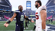 Nov 9, 2025; Seattle, Washington, USA; Seattle Seahawks safety Coby Bryant (8) speaks with Arizona Cardinals tight end Josiah Deguara (45) after the game at Lumen Field. 