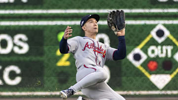 May 9, 2025; Pittsburgh, Pennsylvania, USA; Atlanta Braves right fielder Stuart Fairchild (17) makes a sliding catch for the third out of the fifth inning against the Pittsburgh Pirates at PNC Park. Mandatory Credit: Scott Galvin-Imagn Images