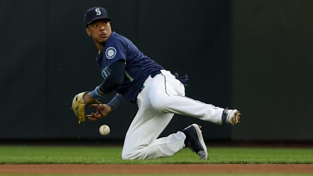 Seattle Mariners second baseman Jorge Polanco (7) drops the ball while fielding a grounder against the Tampa Bay Rays.