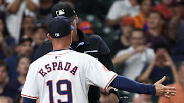 Aug 29, 2024; Houston, Texas, USA; Houston Astros manager Joe Espada (19) argues with home plate umpire Alex Tosi (66) after third baseman Alex Bregman (2) was ejected from the game after arguing his strike out against  the Kansas City Royals in the fourth inning at Minute Maid Park. 