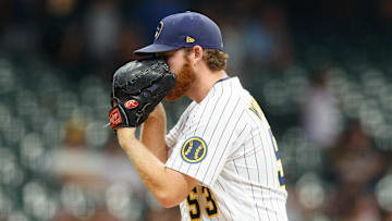 Jun 11, 2021; Milwaukee, Wisconsin, USA;  Milwaukee Brewers pitcher Brandon Woodruff (53) looks in for the sign during the first inning against the Pittsburgh Pirates at American Family Field. Mandatory Credit: Jeff Hanisch-Imagn Images