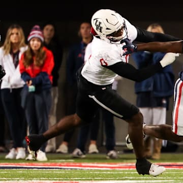 Nov 15, 2024; Tucson, Arizona, USA; Arizona Wildcats running back Kedrick Reescano (3) runs with the ball during the fourth quarter against the Houston Cougars at Arizona Stadium. Mandatory Credit: Aryanna Frank-Imagn Images
