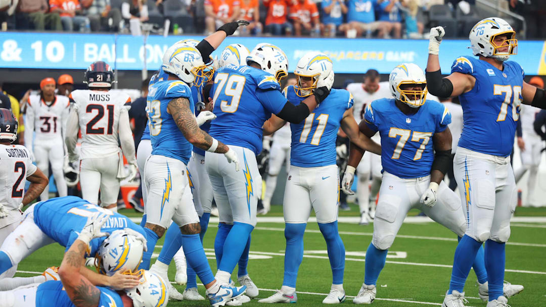 The Los Angeles Chargers react after their win against the Denver Broncos at SoFi Stadium.