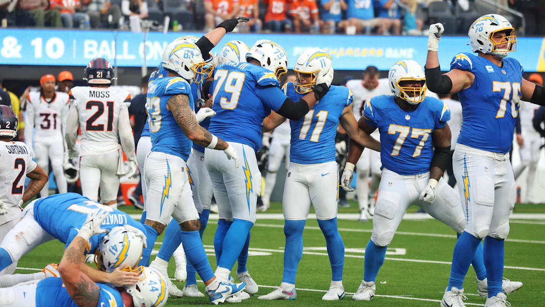 The Los Angeles Chargers react after their win against the Denver Broncos at SoFi Stadium.
