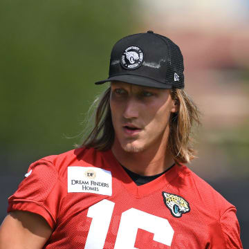 Jacksonville Jaguars quarterback Trevor Lawrence (16) watches the ball after bouncing it off his foot during a break between drills at the organized team activity session Monday, June 3, 2024 at EverBank Stadium's Miller Electric Center in Jacksonville, Fla.