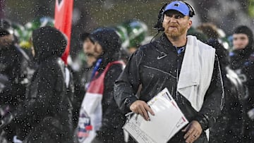 Dec 27, 2023; Annapolis, MD, USA;  Tulane Green Wave head coach interim Slade Nagle walks down the