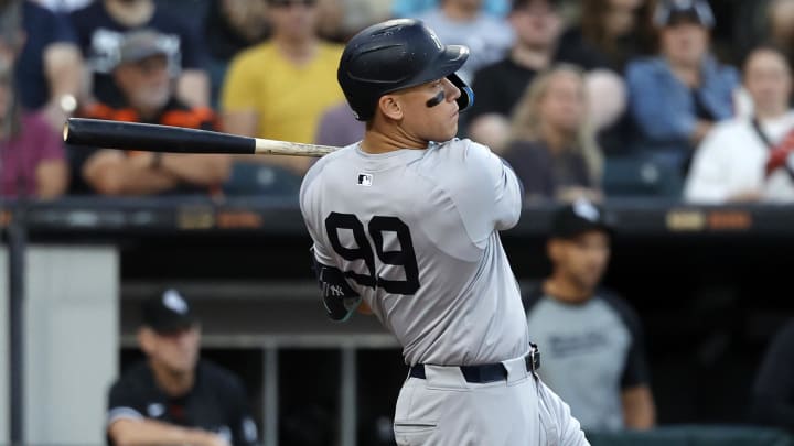 Aug 12, 2024; Chicago, Illinois, USA; New York Yankees outfielder Aaron Judge (99) hits a RBI double against the Chicago White Sox during the first inning at Guaranteed Rate Field. Mandatory Credit: Kamil Krzaczynski-USA TODAY Sports