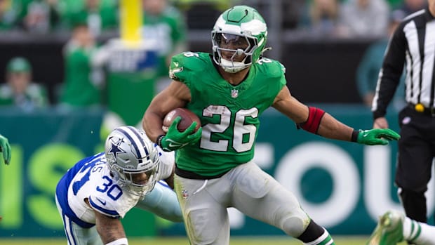 Philadelphia Eagles running back Saquon Barkley runs with the ball 